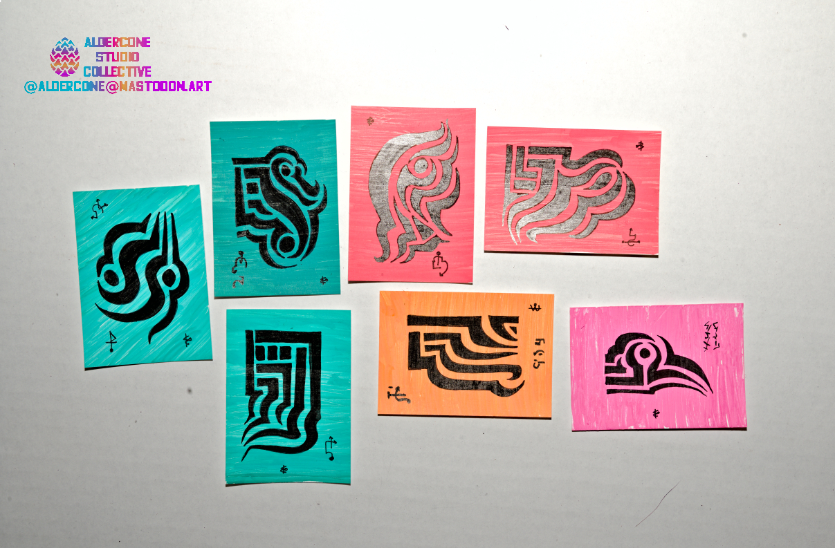hoto of a set of art cards, all are abstract drawings composed of non-intersecting shapes that depict various subjects: birds, faces in profile, strange animals